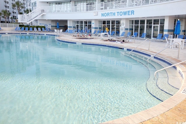 pool with a patio