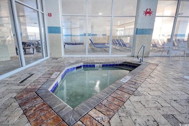 view of swimming pool featuring a patio