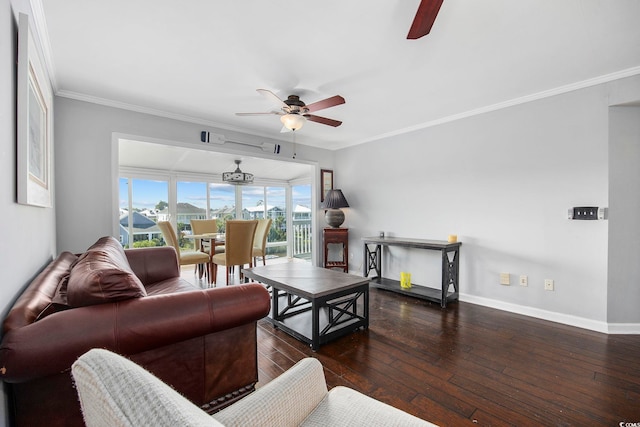 living room featuring dark hardwood / wood-style flooring, ornamental molding, and ceiling fan