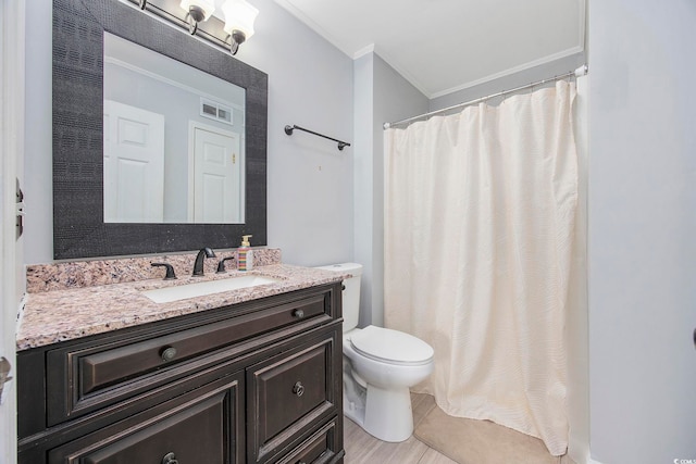 bathroom featuring vanity, toilet, and a shower with shower curtain