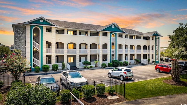 view of outdoor building at dusk