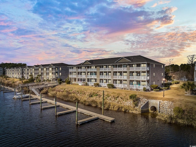 exterior space with a dock