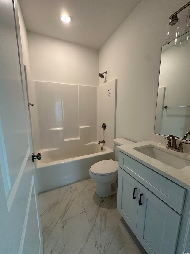 full bathroom with vanity, shower / tub combination, and toilet