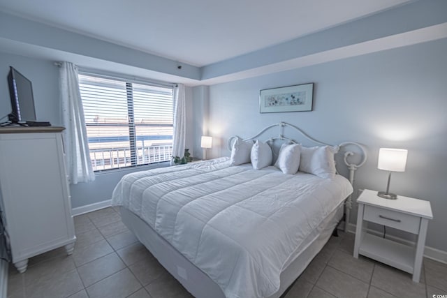 bedroom featuring tile patterned flooring