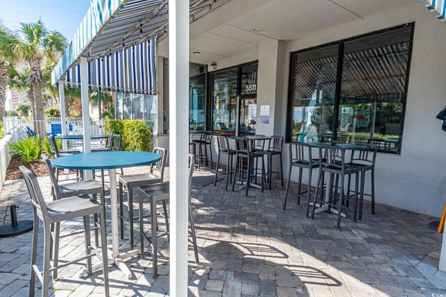 view of patio / terrace with exterior bar