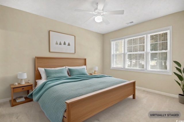 carpeted bedroom featuring ceiling fan