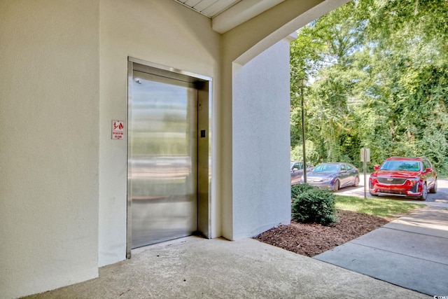 doorway to property with elevator