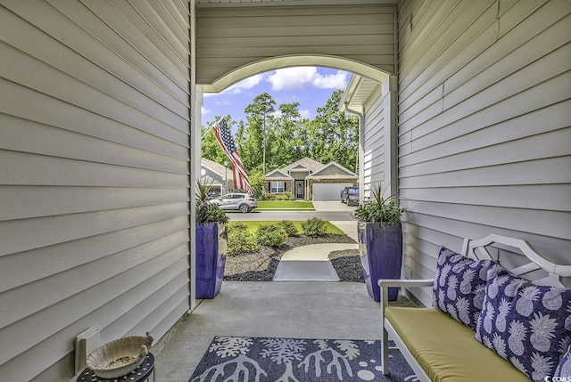 view of patio featuring a garage