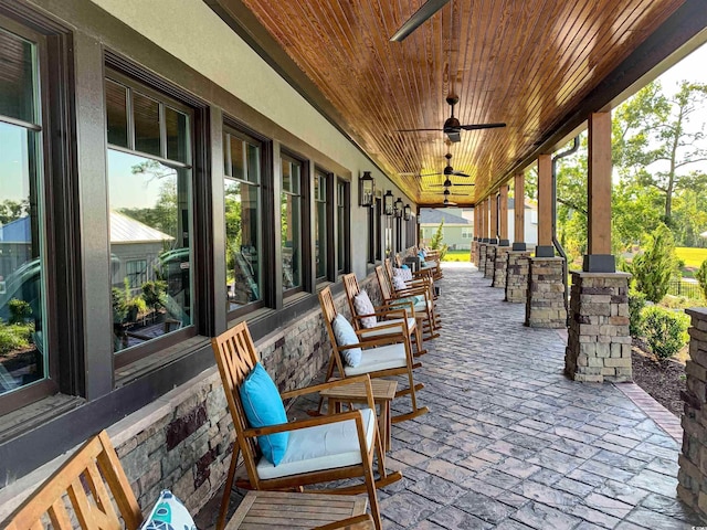 view of patio / terrace featuring ceiling fan and a porch