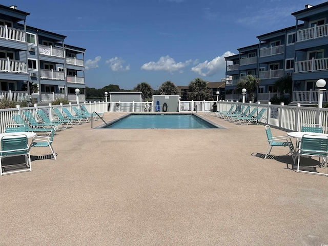 view of pool with a patio area