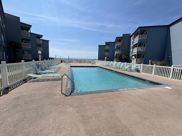 view of pool with a patio area