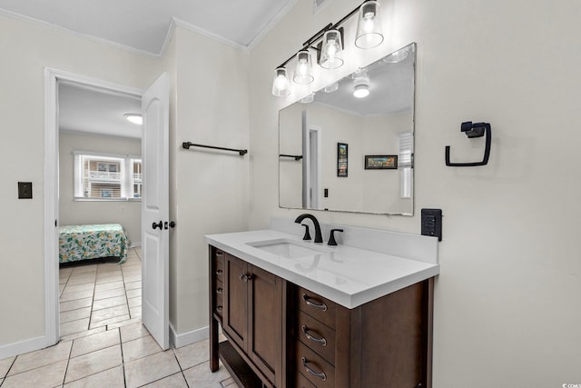 bathroom featuring tile patterned flooring, ornamental molding, and vanity