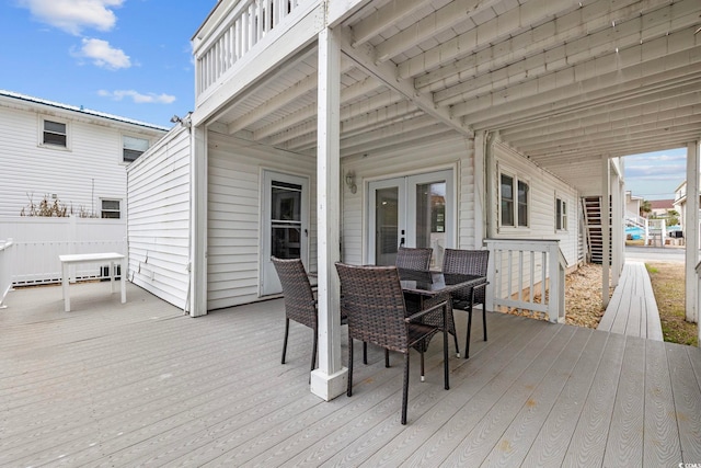 wooden terrace featuring french doors