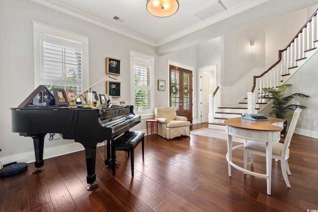 misc room featuring french doors, ornamental molding, plenty of natural light, and hardwood / wood-style floors