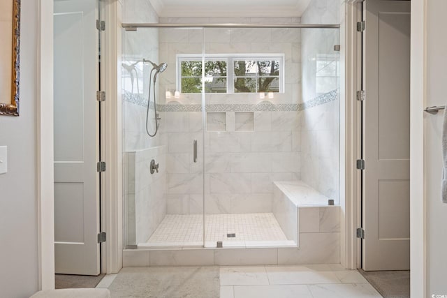 laundry area featuring light hardwood / wood-style floors, independent washer and dryer, cabinets, and crown molding