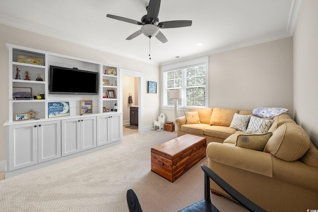 living room featuring ornamental molding, light colored carpet, and ceiling fan