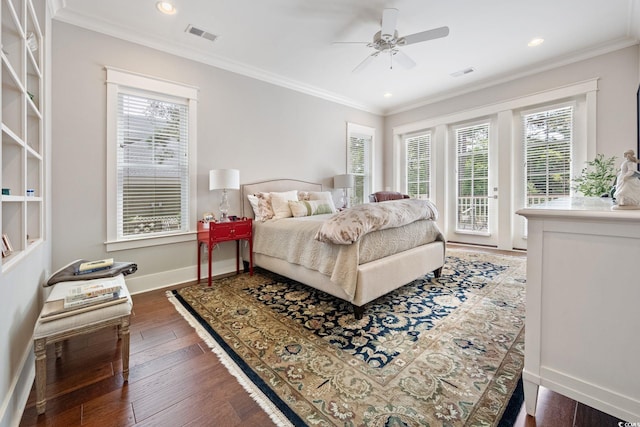 carpeted bedroom featuring crown molding and ceiling fan