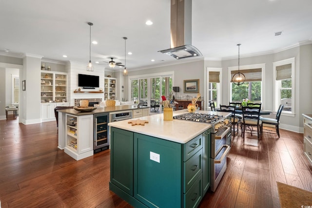 dining space featuring dark wood-type flooring, crown molding, an inviting chandelier, and plenty of natural light