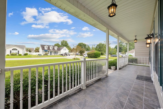 balcony featuring covered porch