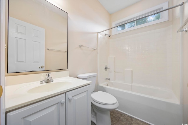 full bathroom featuring tile patterned flooring, vanity, toilet, and washtub / shower combination