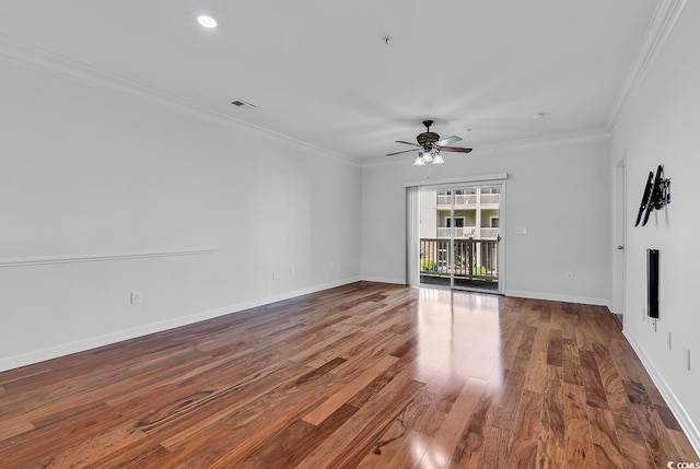 spare room with ceiling fan, crown molding, and wood-type flooring