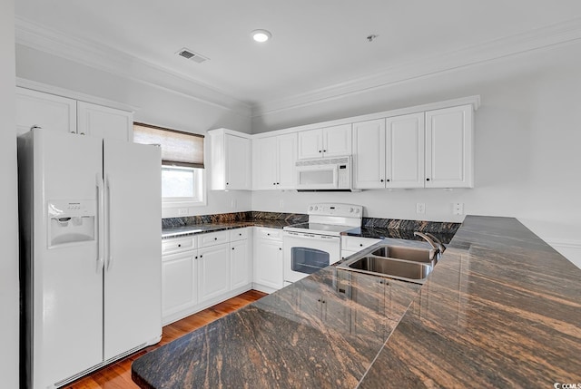 kitchen featuring light hardwood / wood-style floors, white cabinetry, white appliances, crown molding, and sink