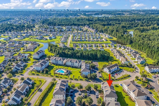 birds eye view of property featuring a water view