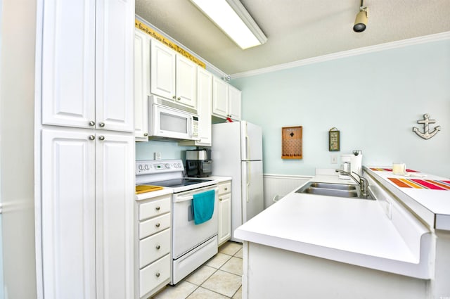 kitchen featuring ornamental molding, white appliances, white cabinetry, and sink