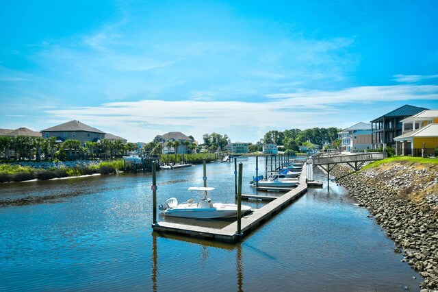 dock area featuring a water view