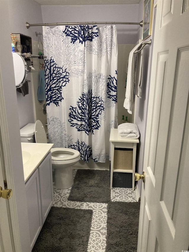 bathroom with vanity and toilet