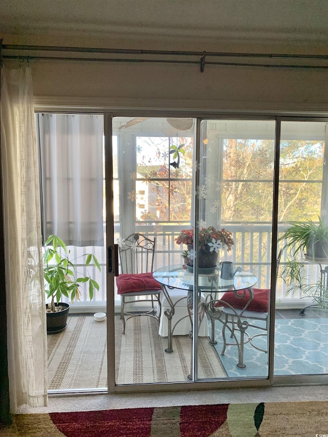 sunroom / solarium with plenty of natural light