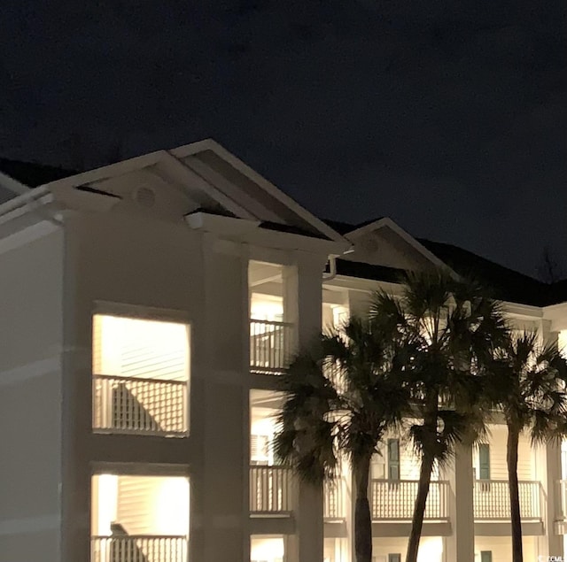 view of property exterior at twilight