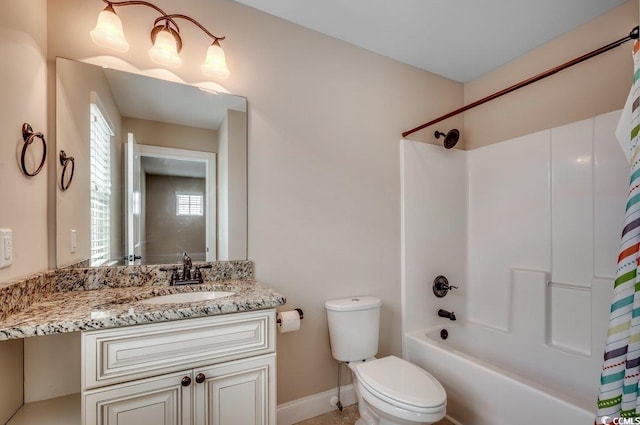 full bathroom featuring shower / bath combination with curtain, vanity, and toilet