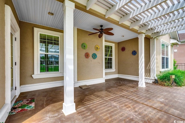 view of patio / terrace featuring a pergola and ceiling fan