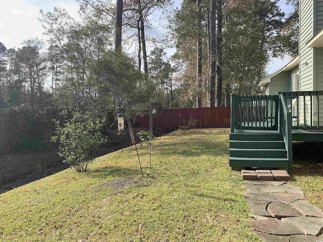 view of yard with a deck