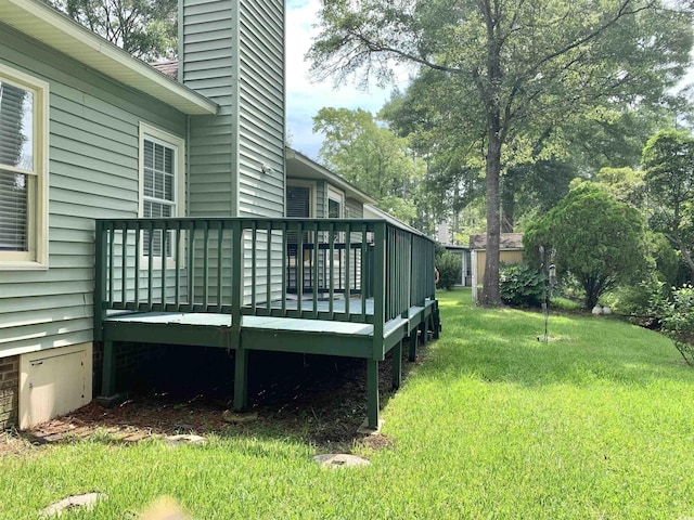 view of yard featuring a wooden deck