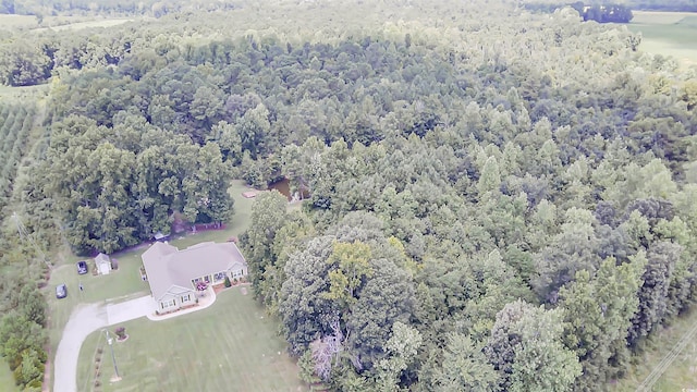 bird's eye view featuring a forest view