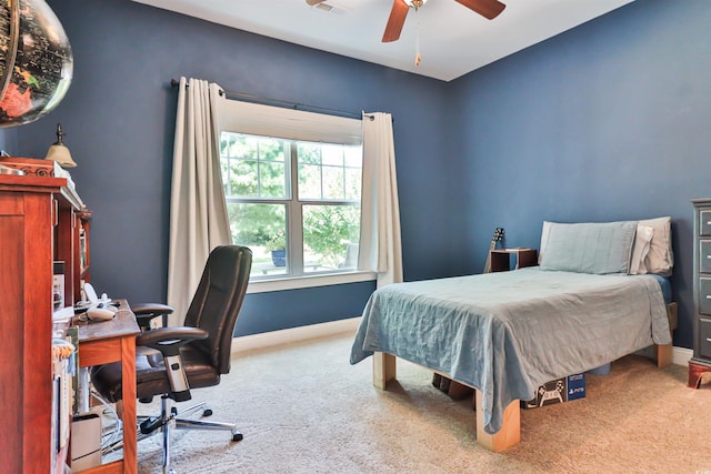 bedroom featuring carpet floors, visible vents, baseboards, and a ceiling fan