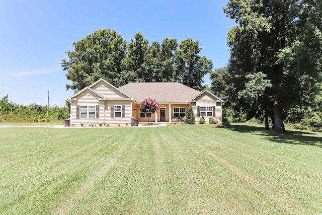 ranch-style house featuring a front lawn