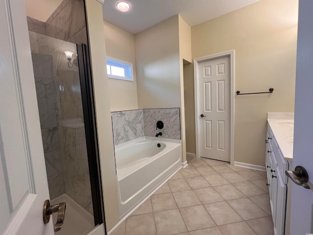 bathroom with shower with separate bathtub, a textured ceiling, vanity, and tile patterned flooring