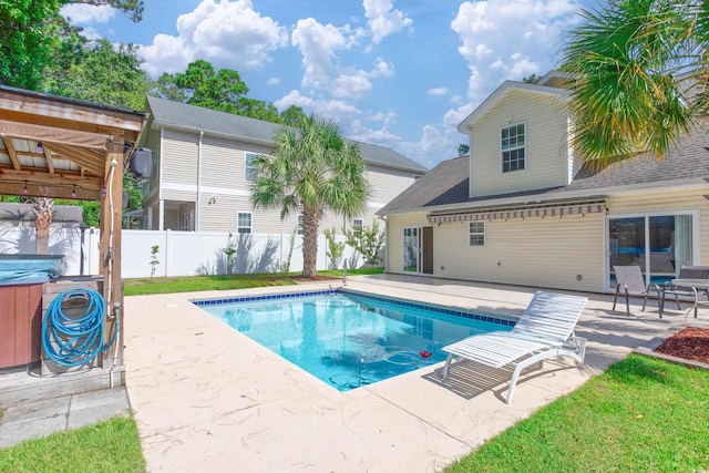 view of pool with a patio area, fence, and a fenced in pool