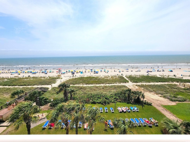 birds eye view of property featuring a view of the beach and a water view