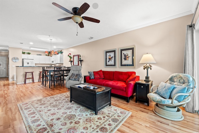 601 Hillside Dr N Unit 2903, North Myrtle Beach, SC 29582 - living area featuring ornamental molding, ceiling fan, light wood-style flooring, and recessed lighting