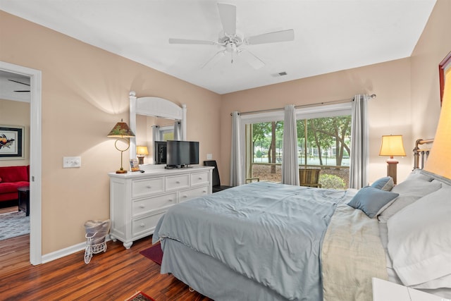 601 Hillside Dr N Unit 2903, North Myrtle Beach, SC 29582 - bedroom with dark wood-style flooring, baseboards, access to outside, and a ceiling fan