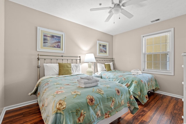 601 Hillside Dr N Unit 2903, North Myrtle Beach, SC 29582 - bedroom featuring baseboards, wood finished floors, and a ceiling fan