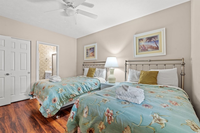 601 Hillside Dr N Unit 2903, North Myrtle Beach, SC 29582 - bedroom featuring wood finished floors, ensuite bathroom, and a ceiling fan