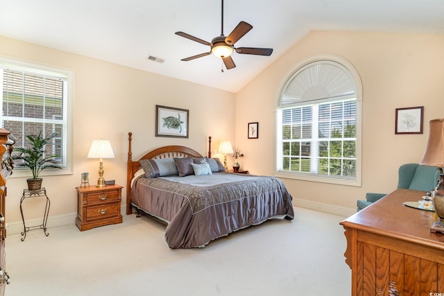 carpeted bedroom with lofted ceiling and ceiling fan