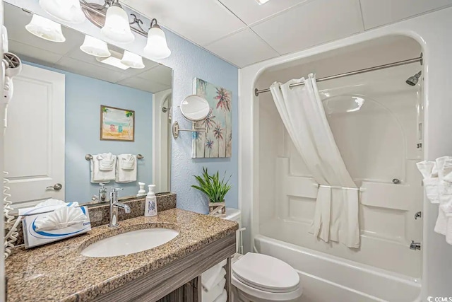 6900 Ocean Blvd N Unit 1410, Myrtle Beach, SC 29572 - bathroom featuring shower / bath combo, a textured wall, toilet, vanity, and a paneled ceiling