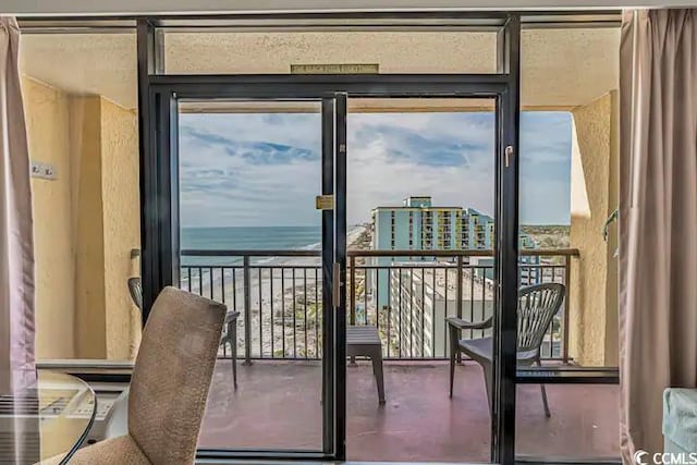 entryway with a water view