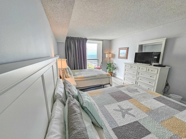 bedroom featuring a textured ceiling